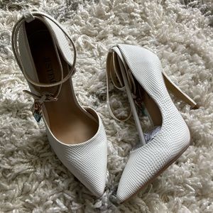Audri White Pumps